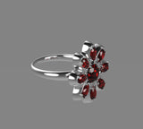 INFINITY FLOWER RING WITH GEM'S